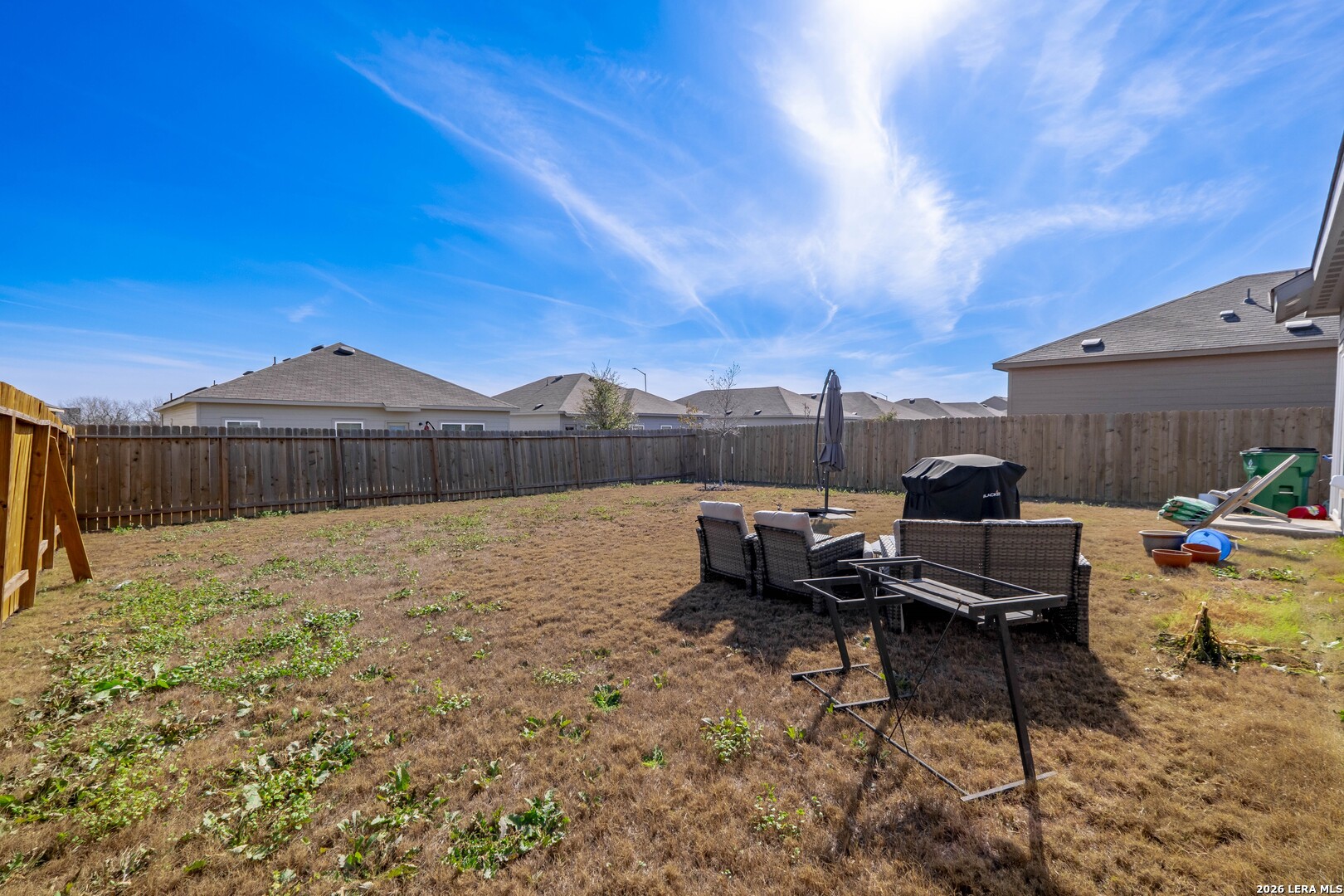 3505 Sky Place Seguin, TX 78155 - Photo 24 of 30 a backyard of a house with table and chairs