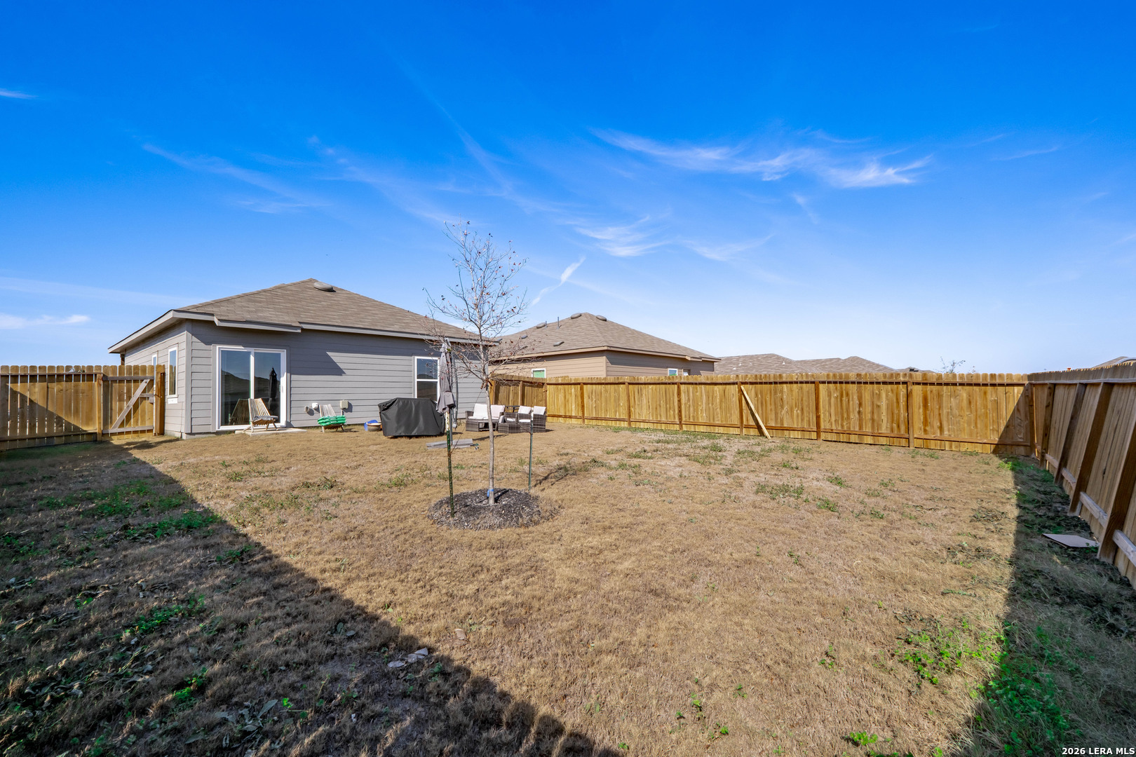 3505 Sky Place Seguin, TX 78155 - Photo 26 of 30 a front view of a house with a yard