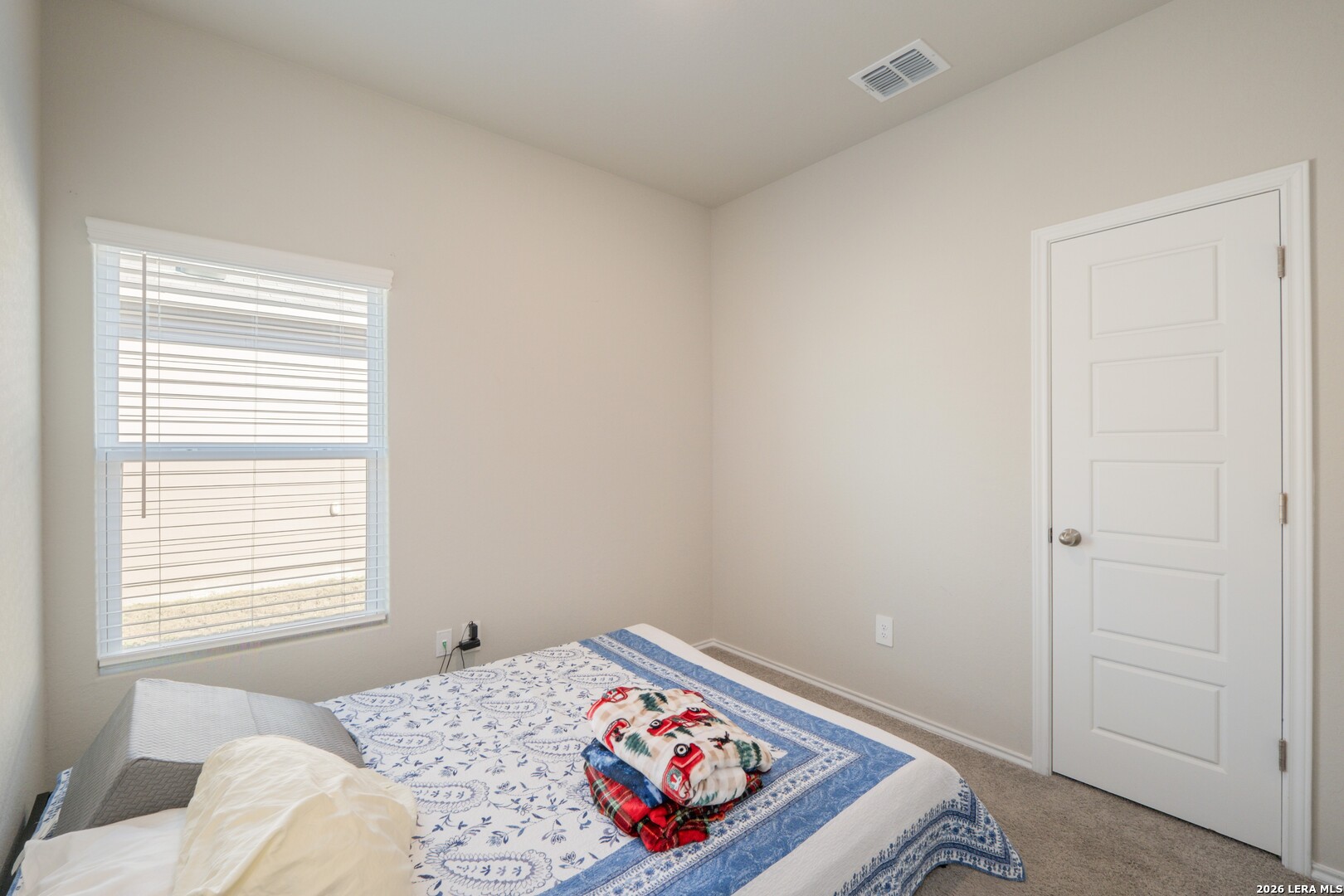 3505 Sky Place Seguin, TX 78155 - Photo 5 of 30 a bedroom with a bed and a window