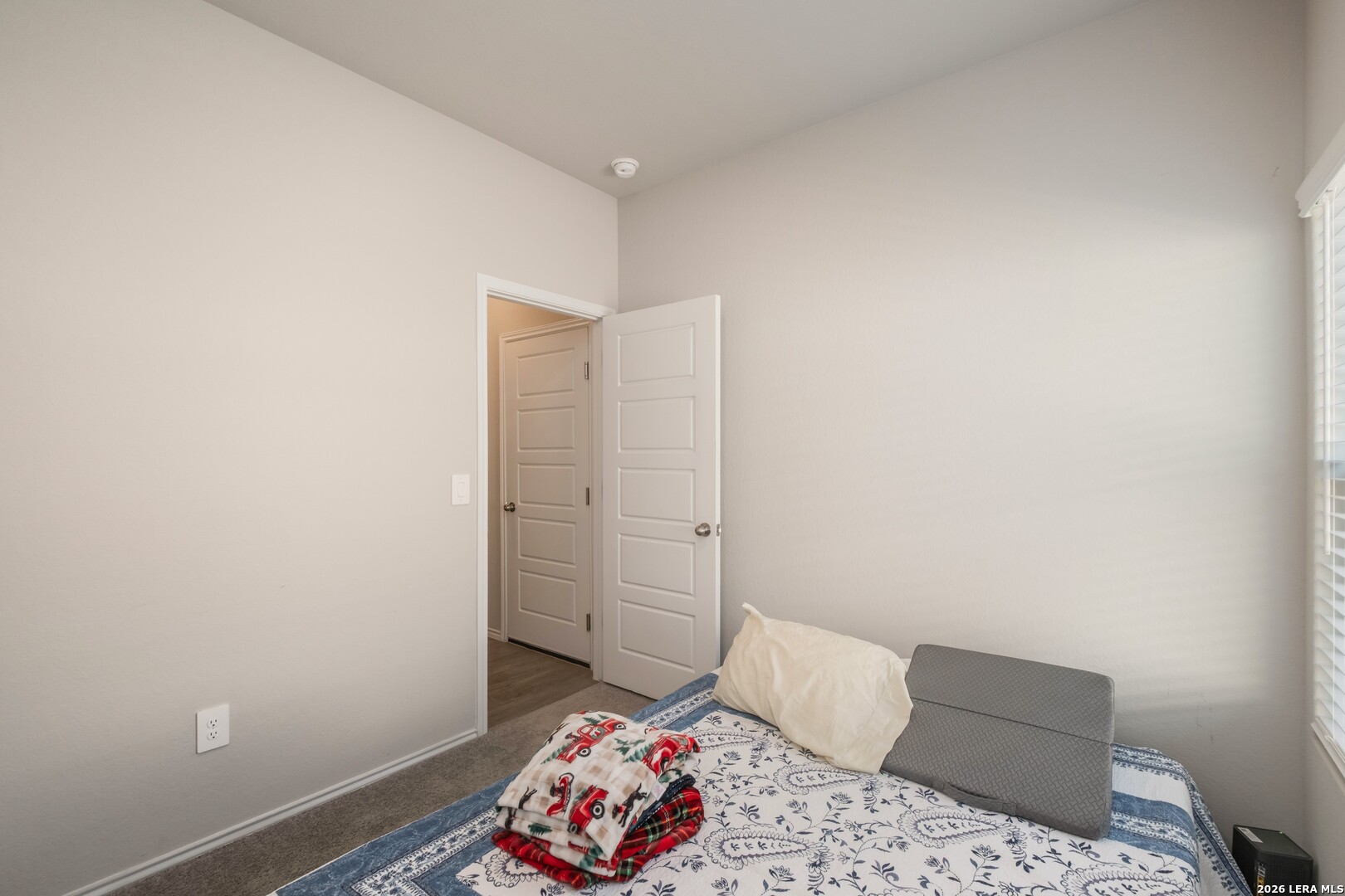 3505 Sky Place Seguin, TX 78155 - Photo 6 of 30 a bedroom with a bed and a window