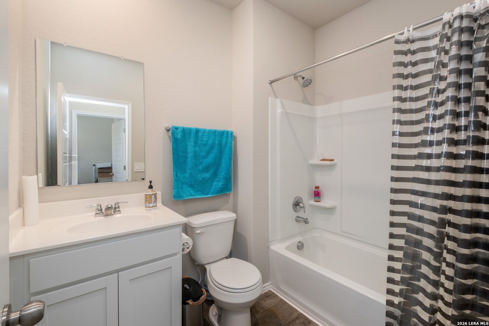 3505 Sky Place Seguin, TX 78155 - Photo 8 of 30 a bathroom with a sink a toilet and shower