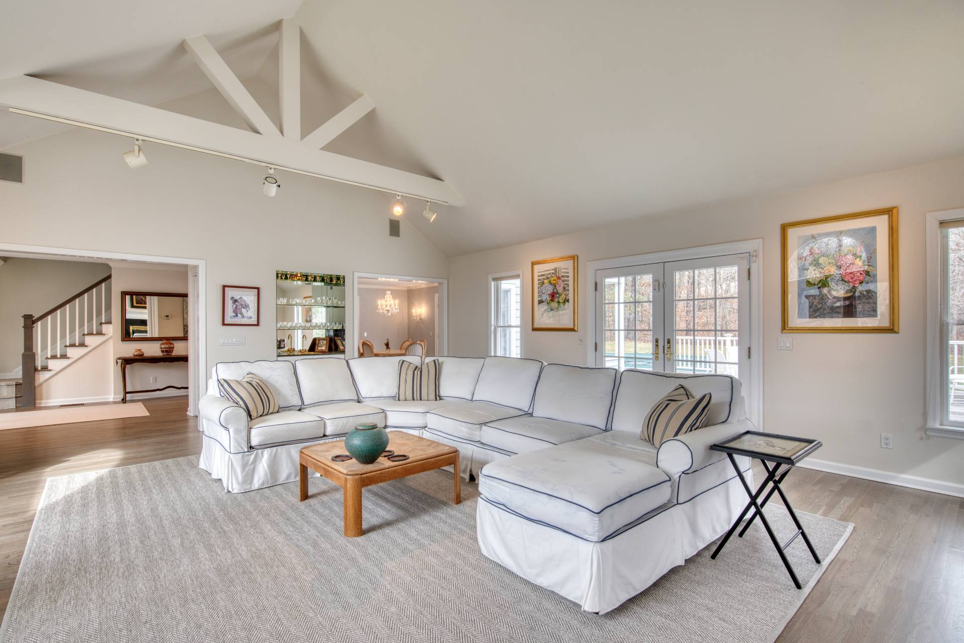 1611 Deerfield Road Water Mill, NY 11976 - Photo 11 of 22 a living room with furniture and a wooden floor