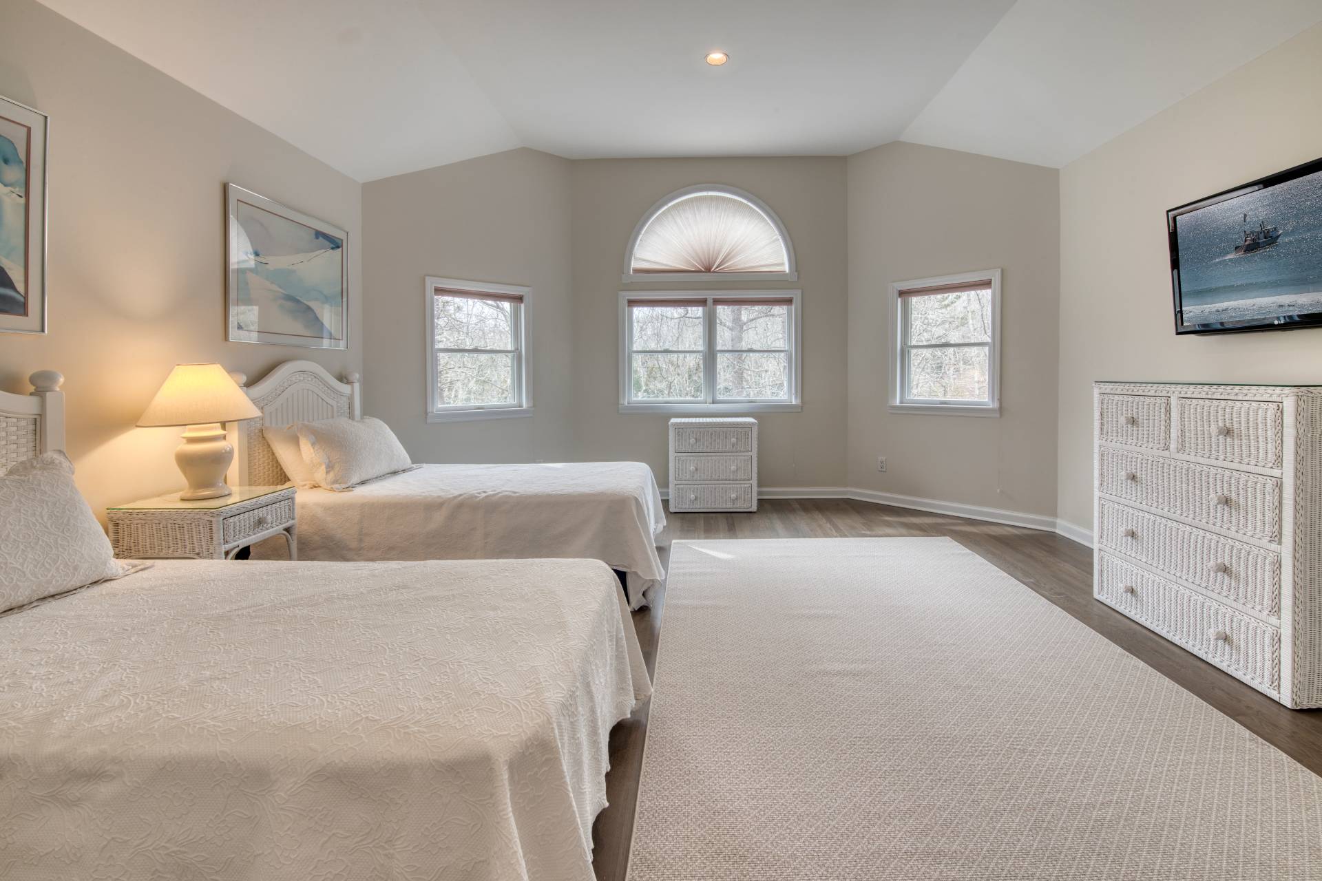 1611 Deerfield Road Water Mill, NY 11976 - Photo 18 of 22 a bedroom with two beds and a flat screen tv