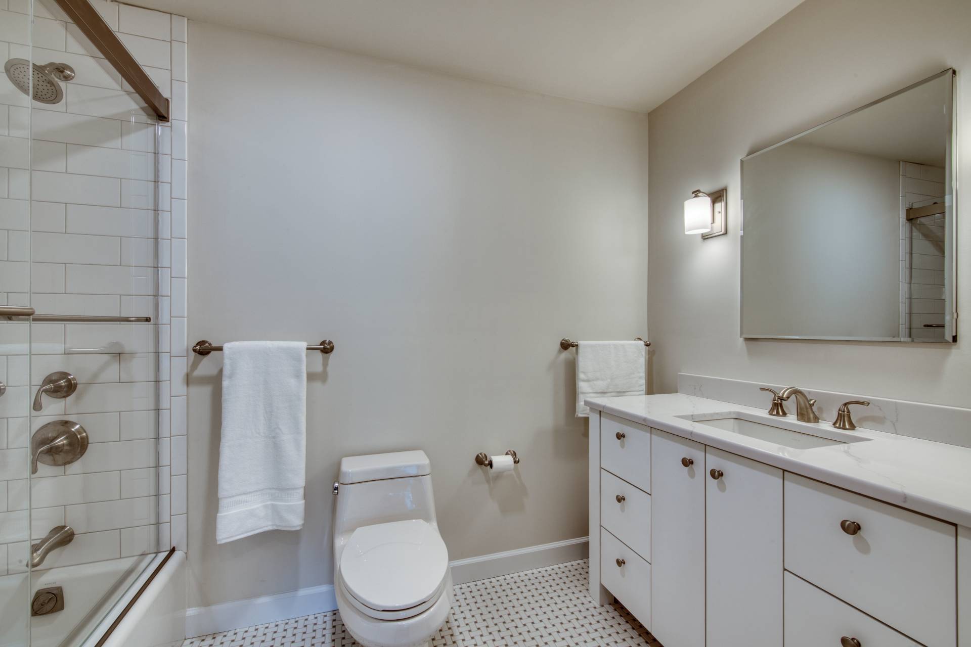 1611 Deerfield Road Water Mill, NY 11976 - Photo 20 of 22 a bathroom with a sink a toilet and shower