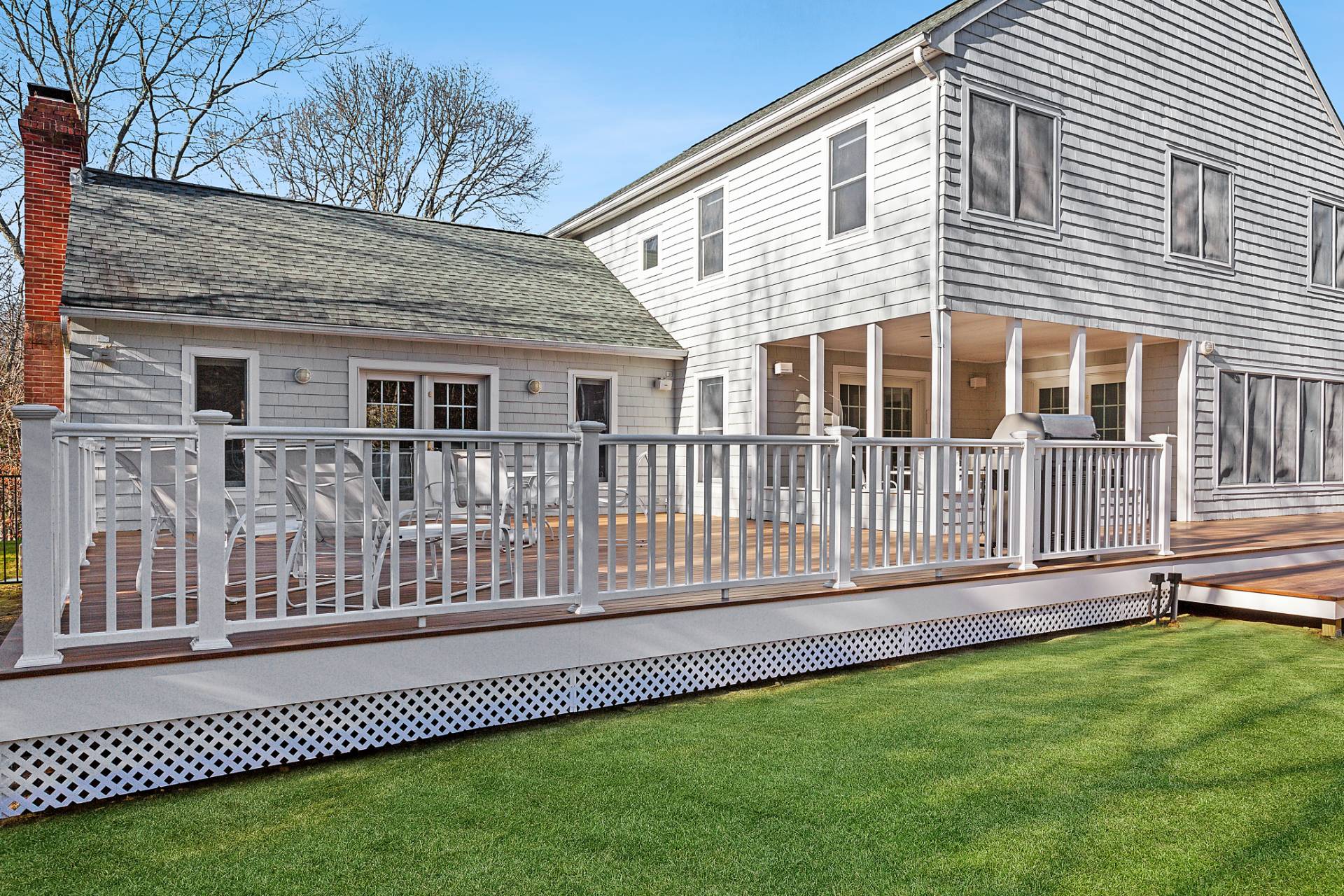 1611 Deerfield Road Water Mill, NY 11976 - Photo 8 of 22 a front view of a house with a yard