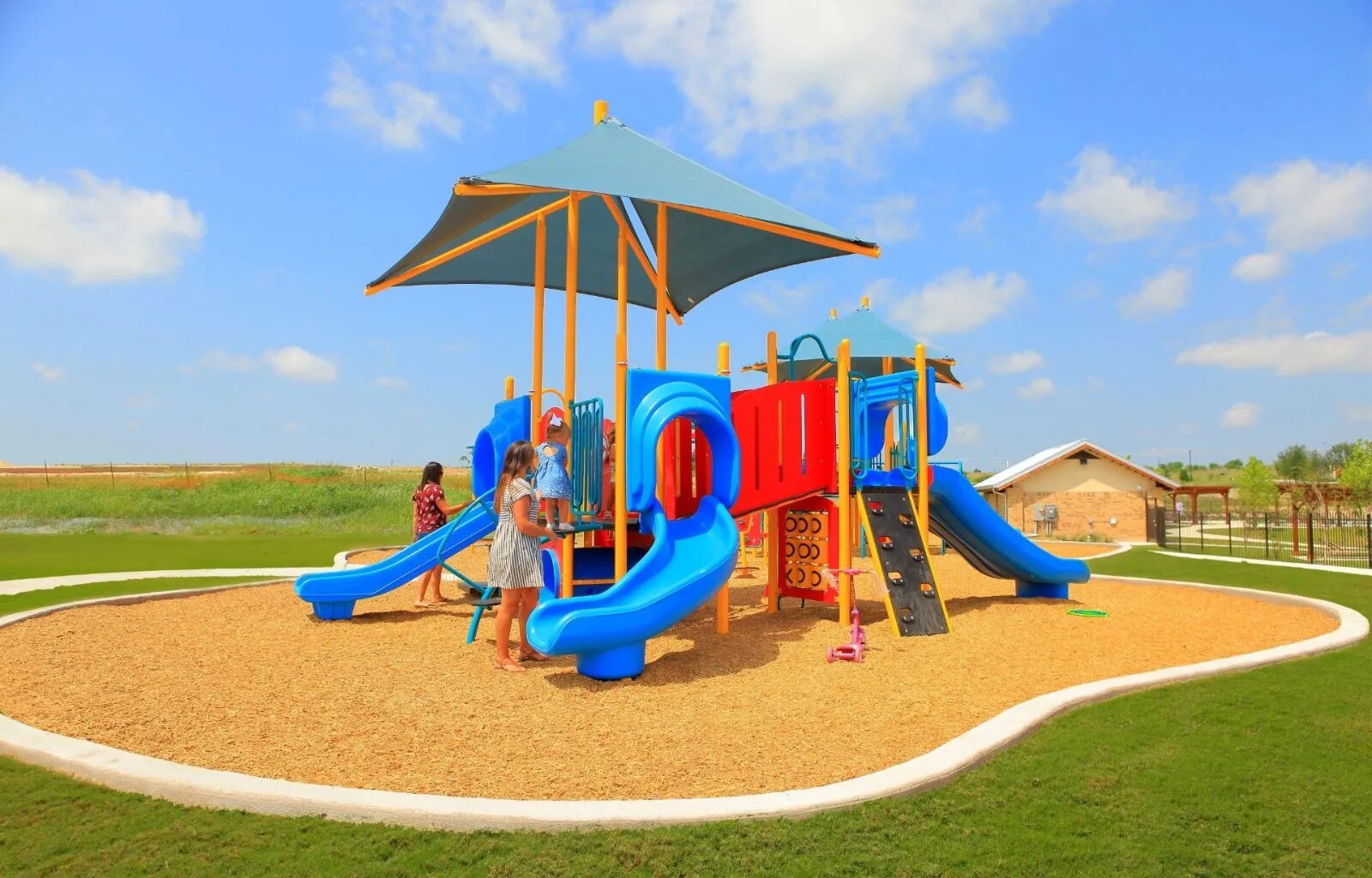 1000 Bright Star Cove Georgetown, TX 78628 - Photo 34 of 40 a view of a park with slide