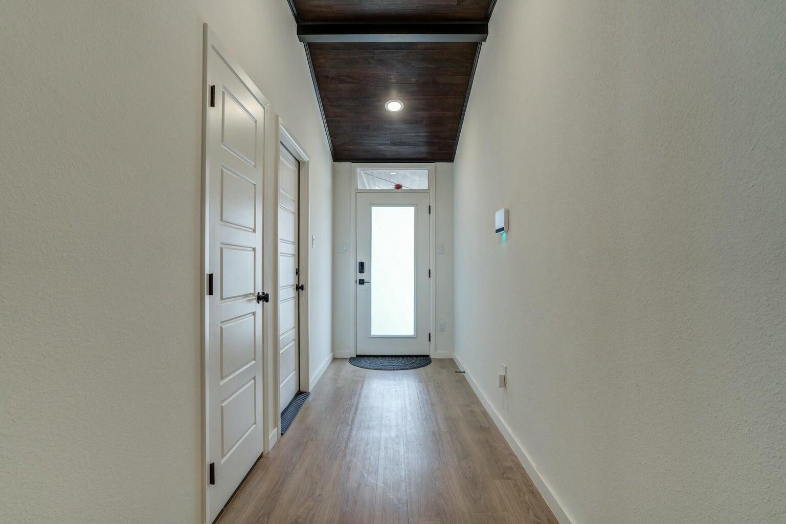 3711 128th Street Lubbock, TX 79423 - Photo 31 of 42 a view of hallway with wooden floor