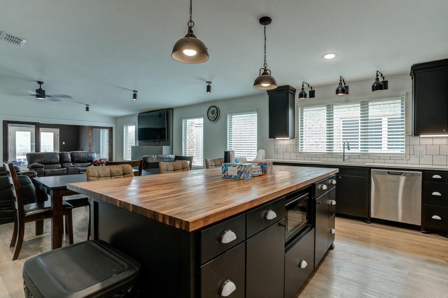 3711 128th Street Lubbock, TX 79423 - Photo 10 of 42 a dining table with chairs and window