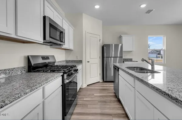 $389,990 | 124 South Gallaspy Drive, Clayton, NC 27520