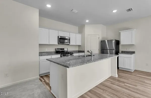 $389,990 | 124 South Gallaspy Drive, Clayton, NC 27520