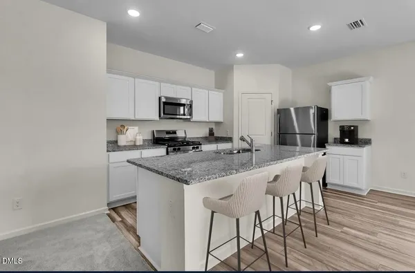 $389,990 | 124 South Gallaspy Drive, Clayton, NC 27520