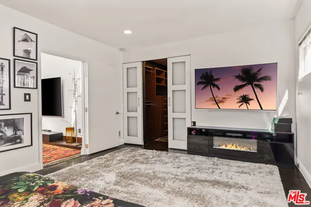 a kitchen with counter top space and dining table