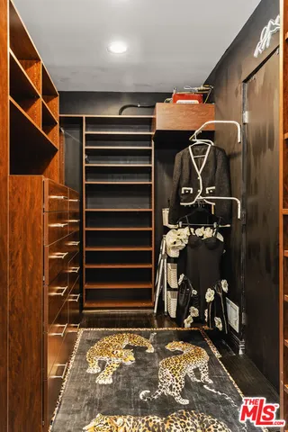 a kitchen with stainless steel appliances a sink and cabinets