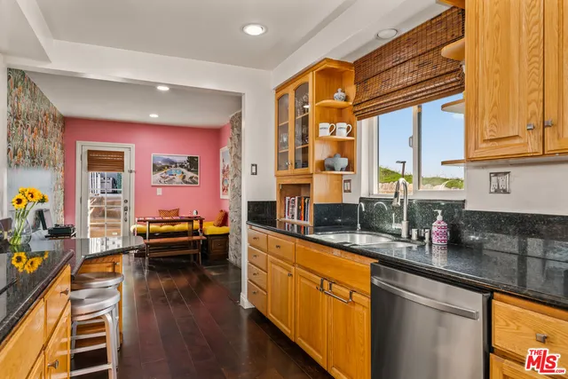 a bedroom with furniture and a fireplace