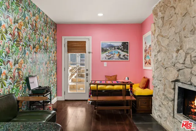 a view of a swimming pool with a patio and a yard