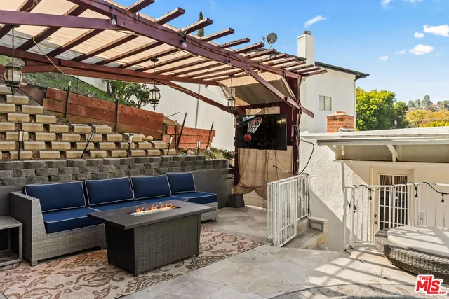 a view of a swimming pool with a patio
