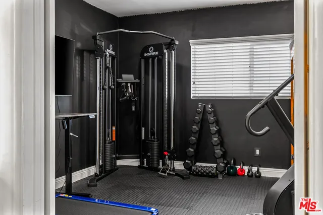 a view of room with gym equipment