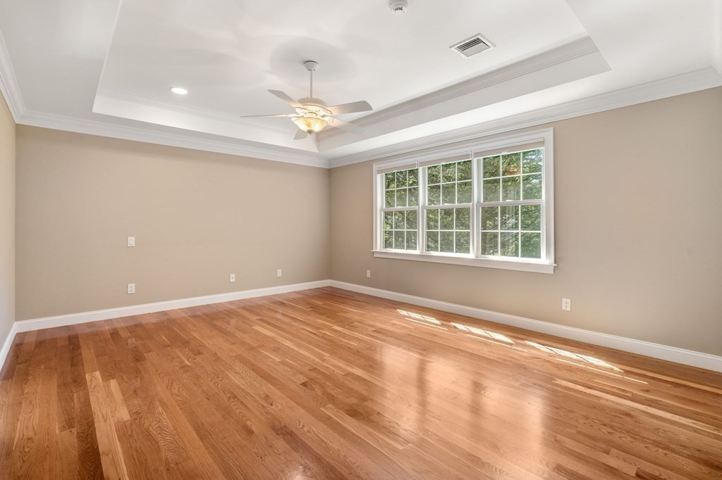 3 Bryn Mawr Road Wellesley, MA 02482 - Photo 15 of 38 an empty room with wooden floor and windows
