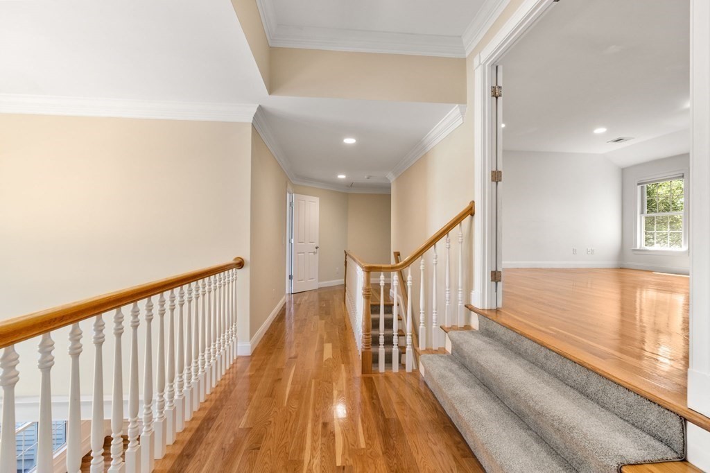 3 Bryn Mawr Road Wellesley, MA 02482 - Photo 23 of 38 a view of a room with wooden floor and stairs