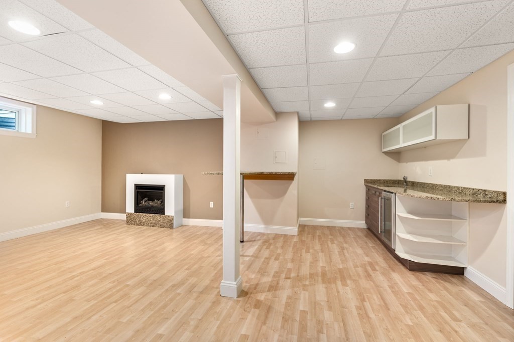 3 Bryn Mawr Road Wellesley, MA 02482 - Photo 26 of 38 a view of an empty room with a fireplace