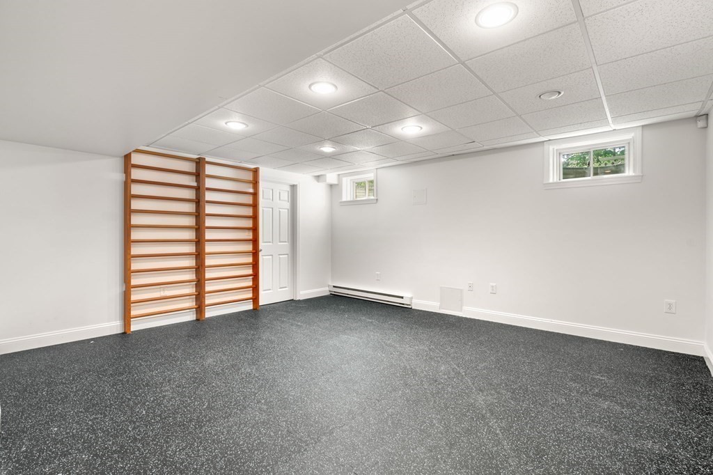 3 Bryn Mawr Road Wellesley, MA 02482 - Photo 30 of 38 an empty room with windows and closet