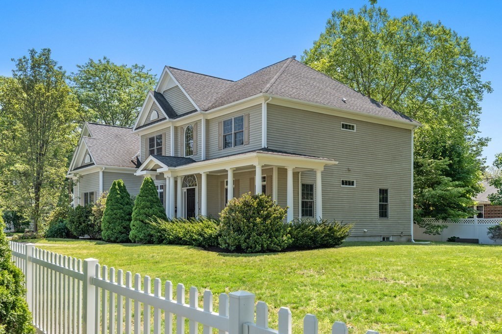 3 Bryn Mawr Road Wellesley, MA 02482 - Photo 33 of 38 a front view of a house with a yard