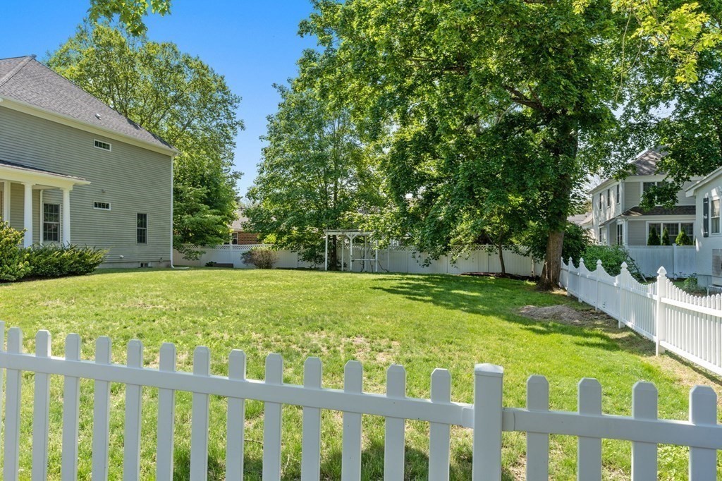 3 Bryn Mawr Road Wellesley, MA 02482 - Photo 34 of 38 a view of a porch with a yard