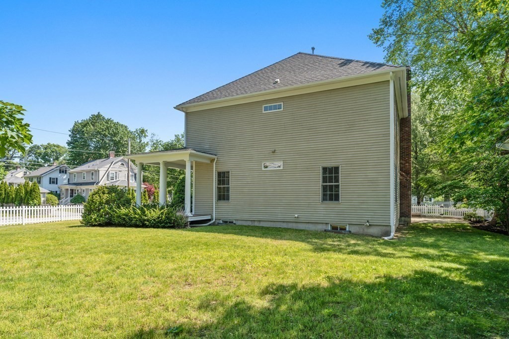 3 Bryn Mawr Road Wellesley, MA 02482 - Photo 36 of 38 a front view of house with yard