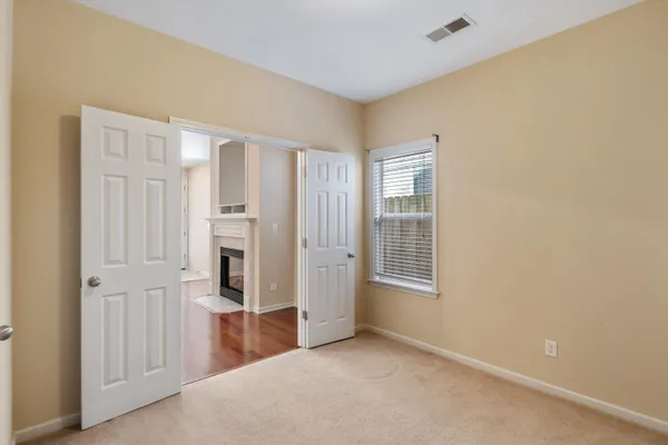 an empty room with windows