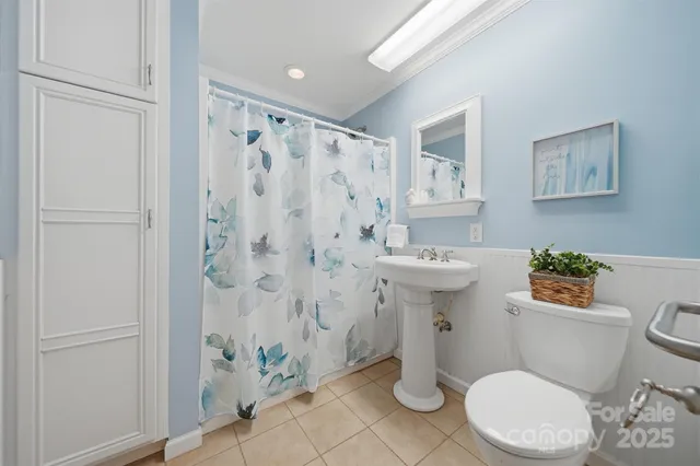 a view of a balcony with wooden floor