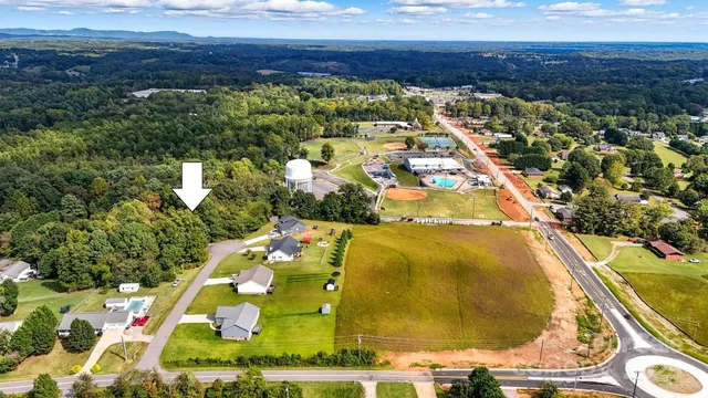 an aerial view of residential house with outdoor space