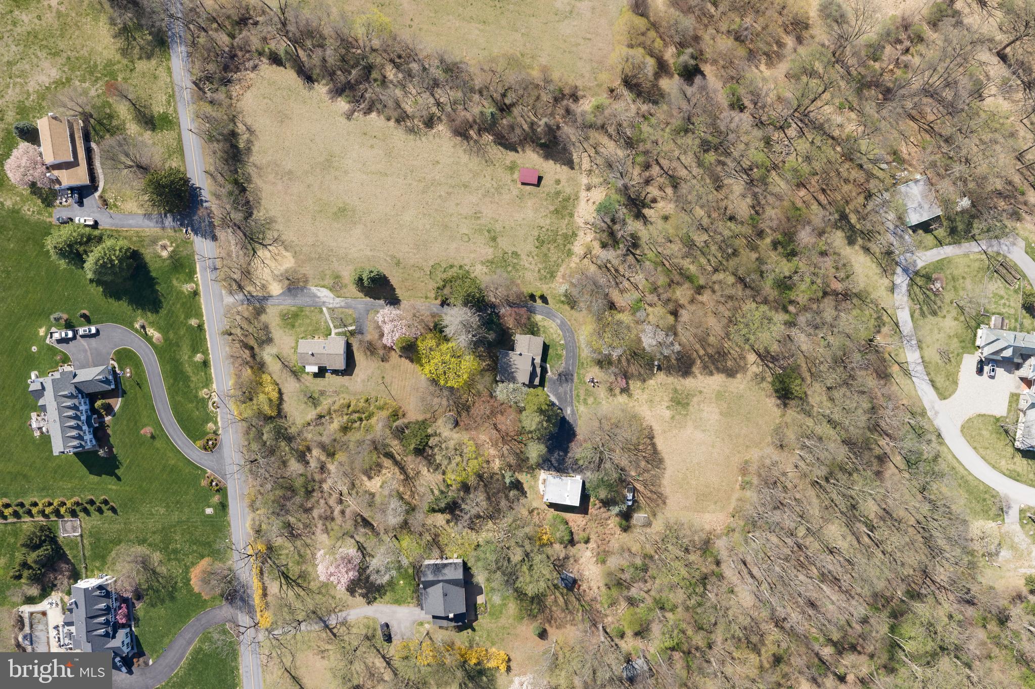 7.2 acres - "LOTS" of Possibilities!