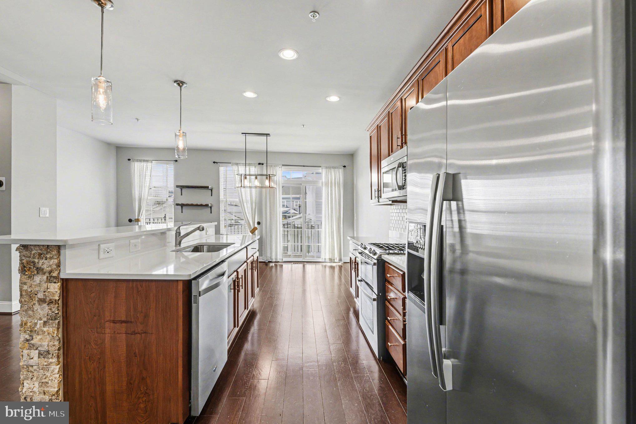 5954 Logans Way Ellicott City, MD 21043 - Photo 15 of 46 Recessed lighting and SS appliances