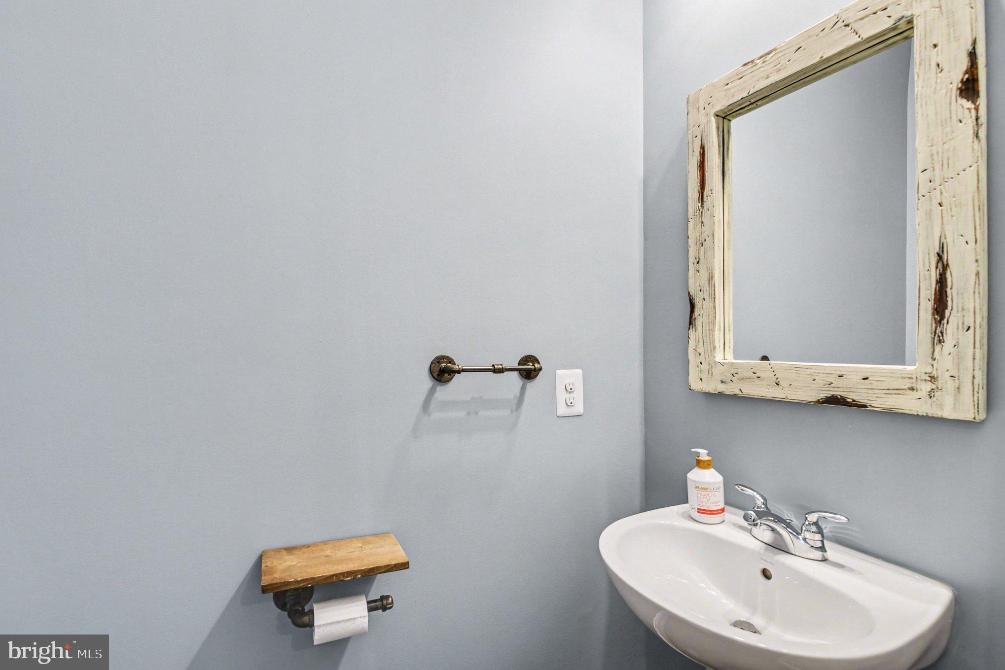 5954 Logans Way Ellicott City, MD 21043 - Photo 19 of 46 Main level half bath