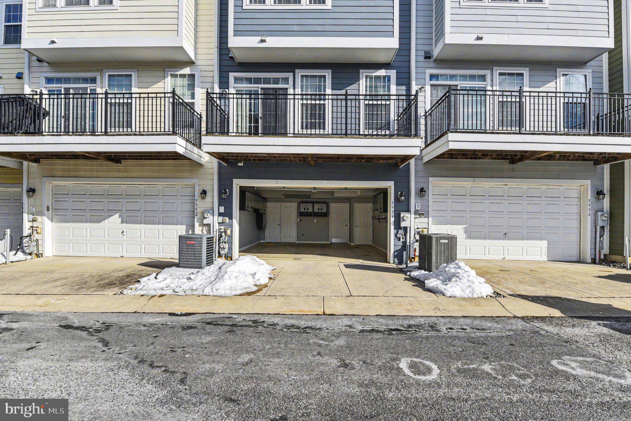 5954 Logans Way Ellicott City, MD 21043 - Photo 37 of 46 Rear entry garage with extra parking