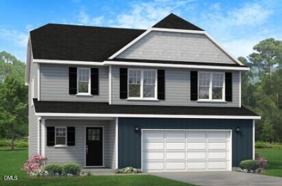 114 Ambrosia Way Bunnlevel, NC 28323 - Photo 2 of 3 a front view of a house with garden