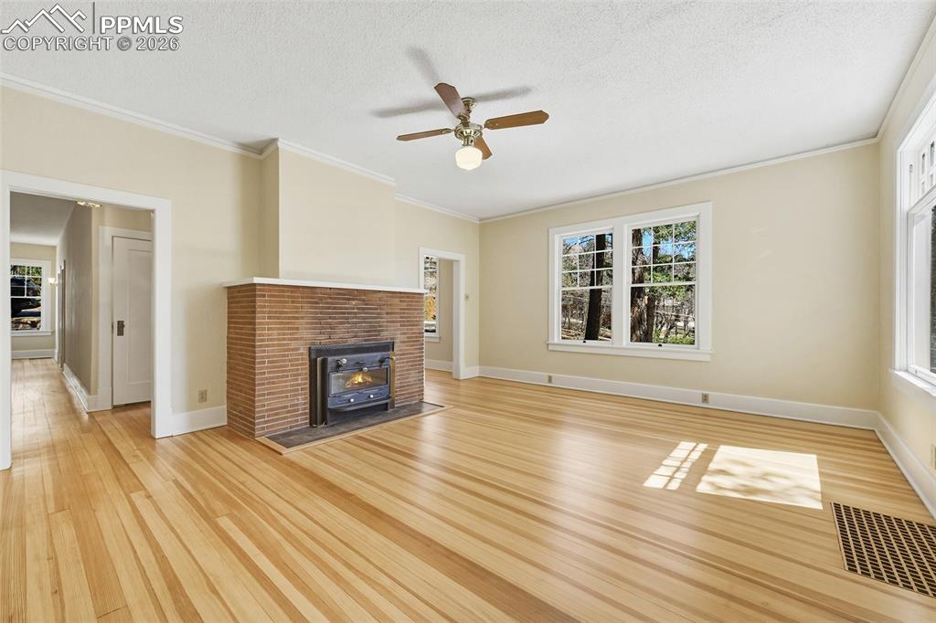 4530 Hagerman Road Cascade, CO 80809 - Photo 11 of 47 Large Living Room With Wood Burning Fireplace