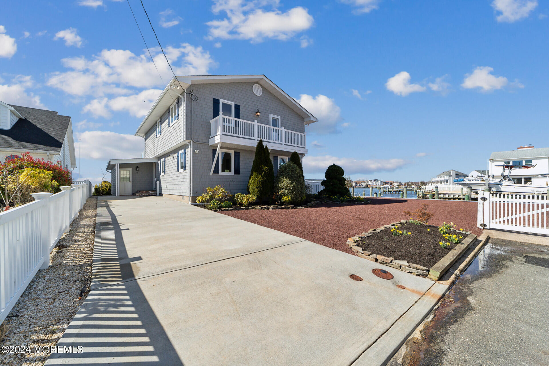 4 Neptune Road Toms River, NJ 08753 - Photo 14 of 24 a front view of a house with a yard
