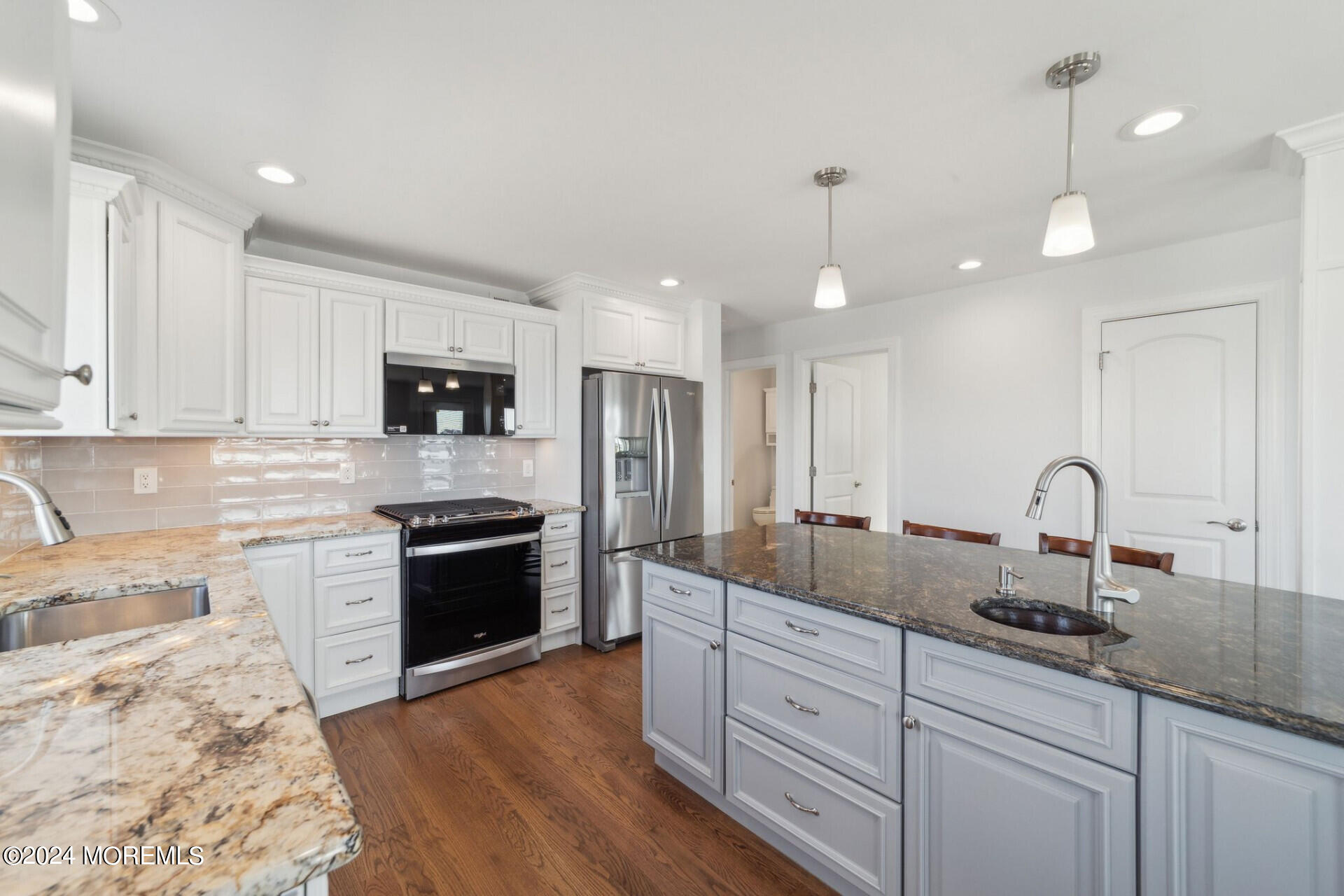 4 Neptune Road Toms River, NJ 08753 - Photo 5 of 24 a kitchen with stainless steel appliances granite countertop a sink a stove and a refrigerator
