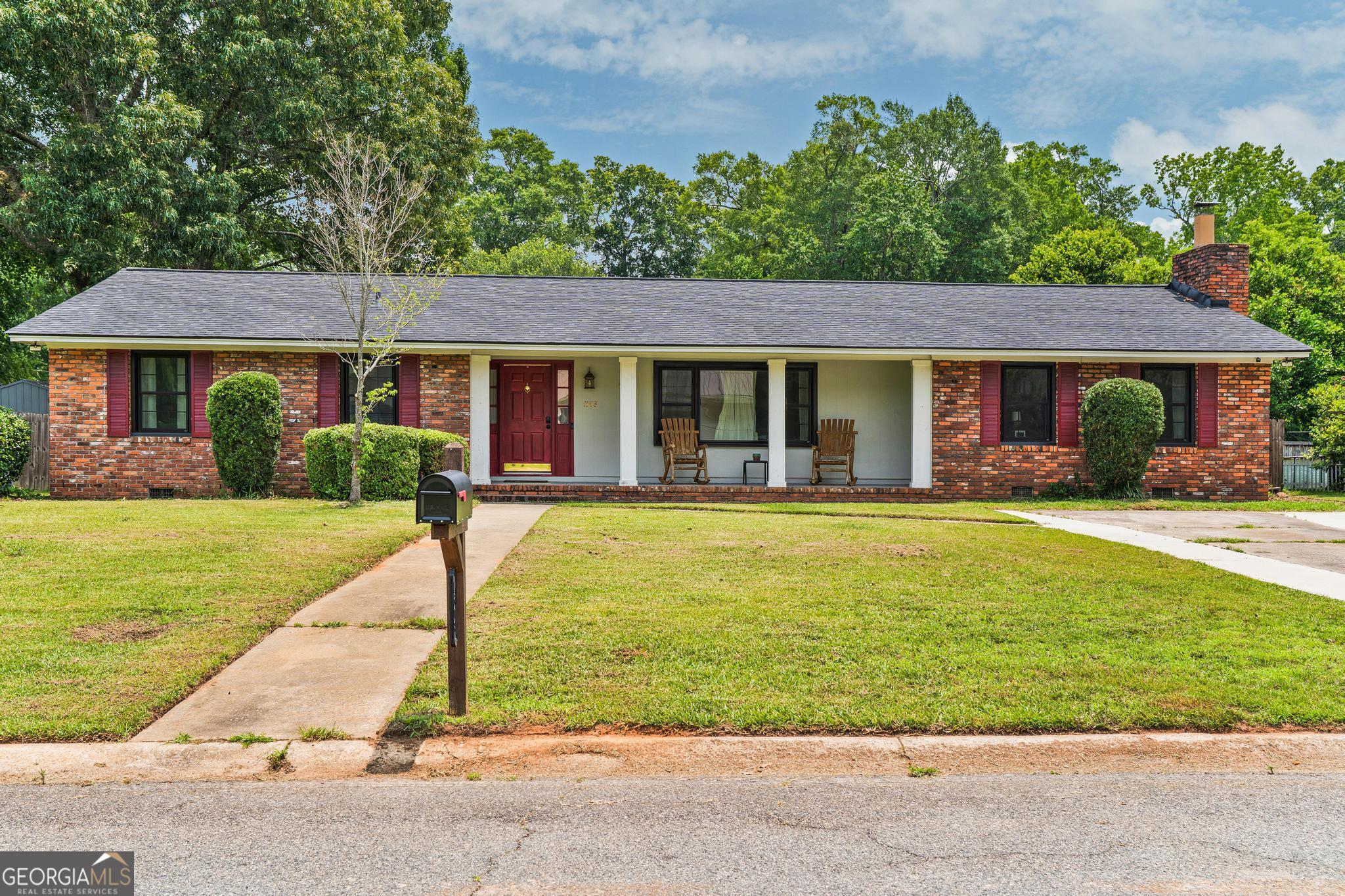 1508 Windsor Road Perry, GA 31069 - Photo 1 of 1 front view of house with a yard