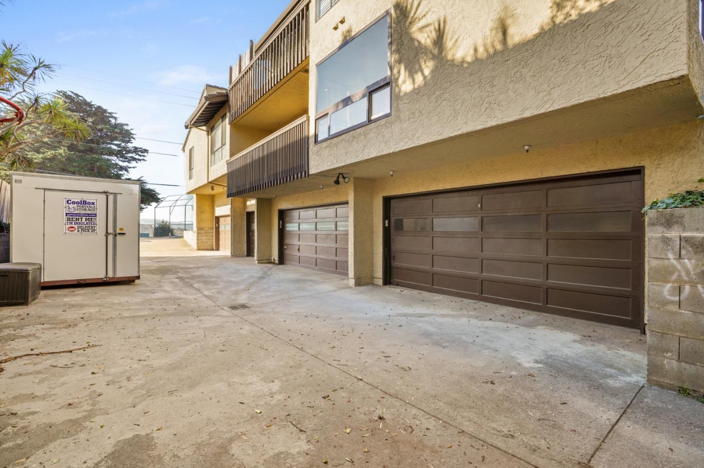 207 Monterey Road, Unit 3 Pacifica, CA 94044 - Photo 31 of 43 a view of a house with garage
