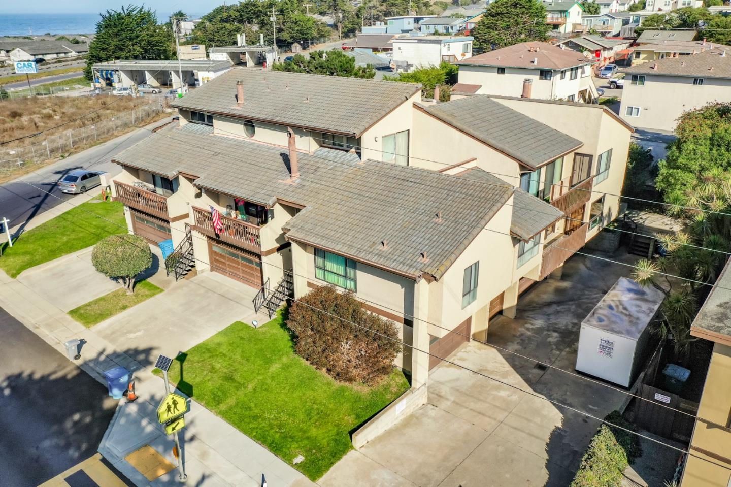 207 Monterey Road, Unit 3 Pacifica, CA 94044 - Photo 4 of 43 an aerial view of a house with a yard