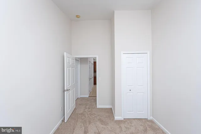 a view of a balcony with a yard