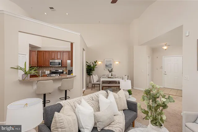 a living room with furniture and a table