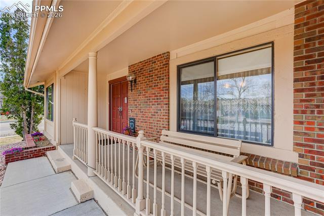 699 Gilcrest Road Colorado Springs, CO 80906 - Photo 4 of 37 Welcoming front porch!