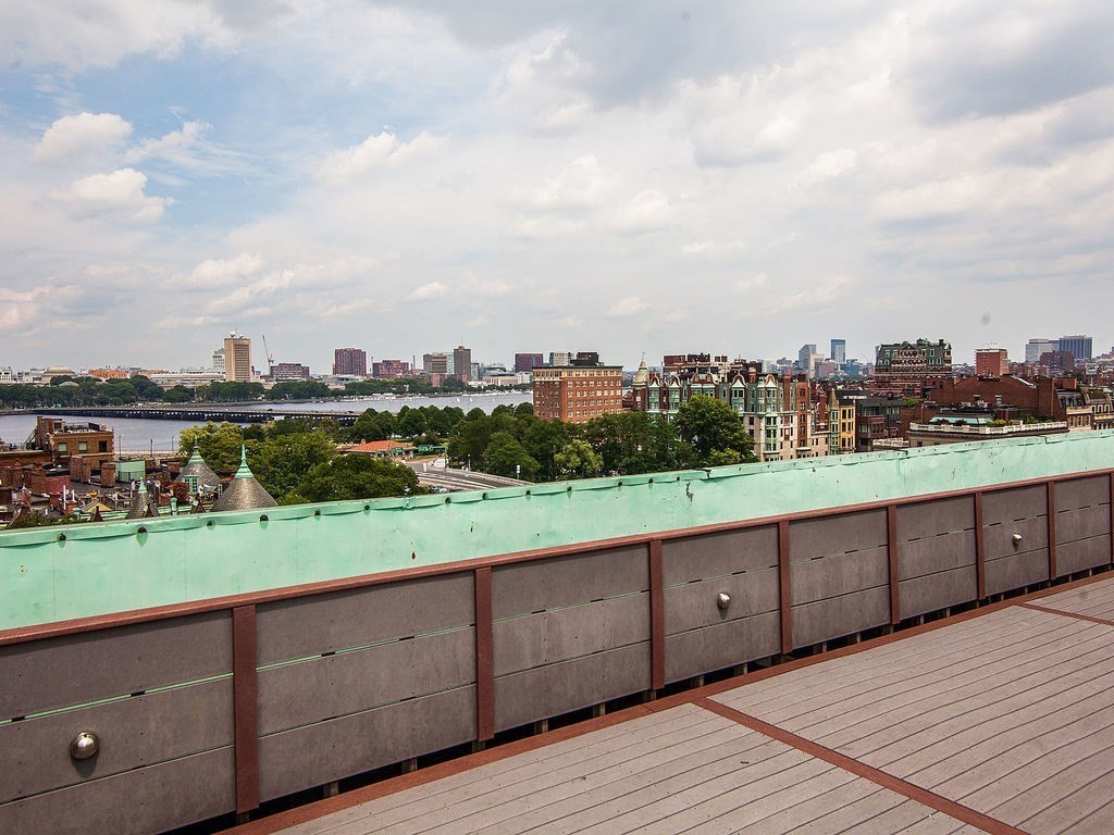 464 Commonwealth Avenue, Unit 36 Boston, MA 02215 - Photo 11 of 18 a view of a yard and an ocean view