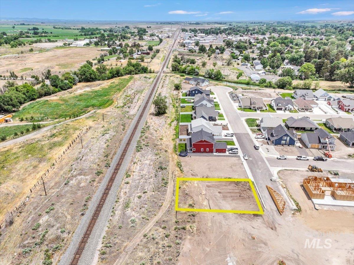 1018 Liberty Street Gooding, ID 83330 - Photo 15 of 18 Aerial perspective of suburban area featuring property boundaries highlighted