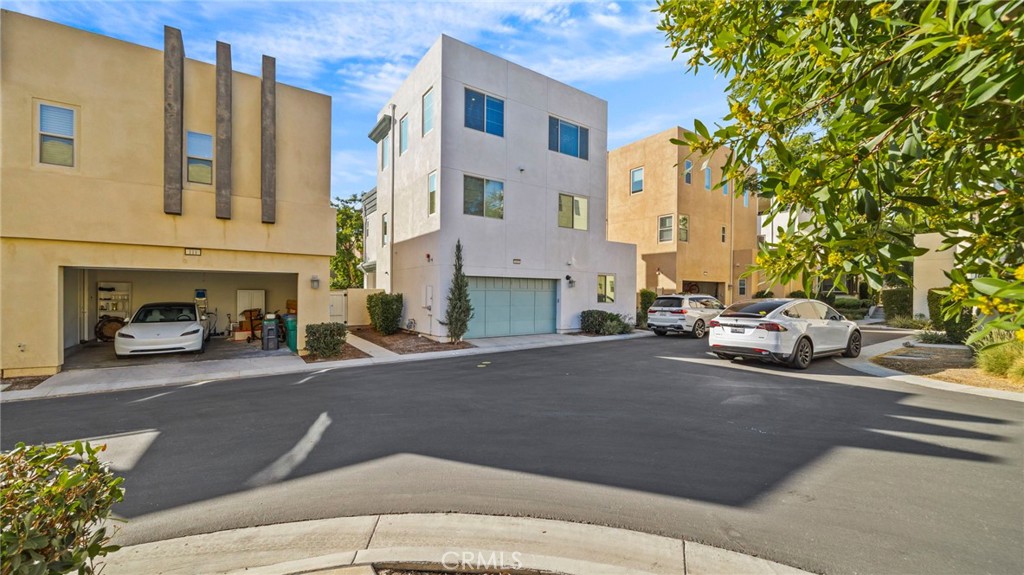 113 Carmine Irvine, CA 92618 - Photo 2 of 43 a car parked in front of a building