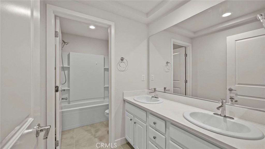 113 Carmine Irvine, CA 92618 - Photo 22 of 43 a bathroom with a double vanity sink mirror and double