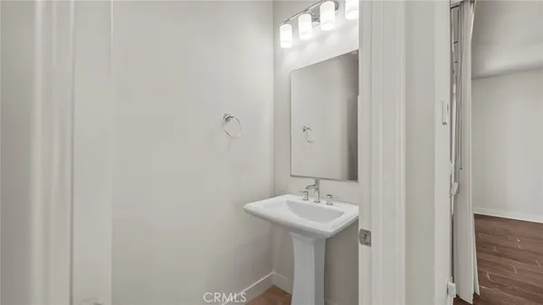 a bathroom with a sink and mirror